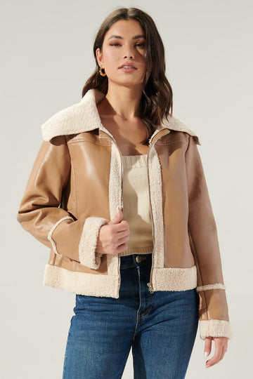 Elevated Warmth & Style This faux leather sheepskin jacket raises the bar on looking cool and feeling warm this winter. Relaxed Fit. Poly/PolyE/Rayon Model is 5'9