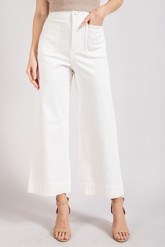 Year Round Chic A soft washed button closure wide leg pant that pairs great with sweaters, tanks, tops and more! Versatile. Cotton. Model is 5'8